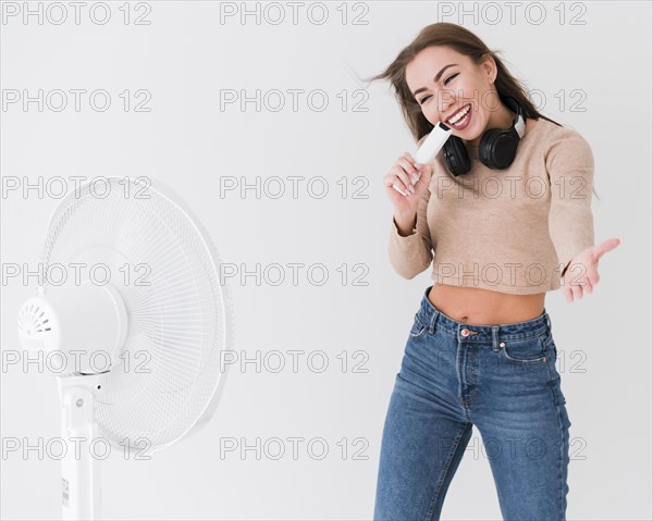 Woman singing open fan