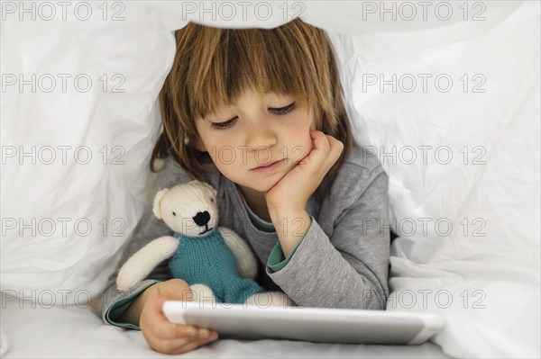 Little boy using tablet