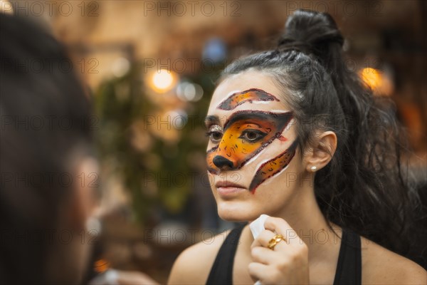 Halloween party hairstyle and makeup preparations