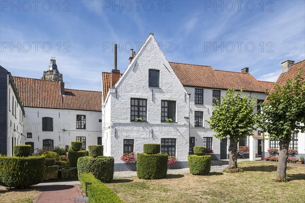 White beguines' houses in courtyard of the Beguinage of Oudenaarde