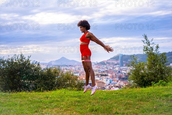 Fitness with a young black girl with afro hair