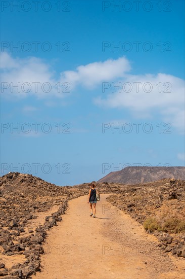 A young woman visiting the Isla de Lobos