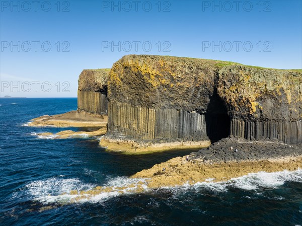 Aerial view of the uninhabited rocky island of Staffa with the prominent basalt columns and Fingal's Cave