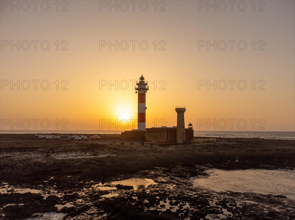 Aerial view of the Toston Lighthouse at sunset