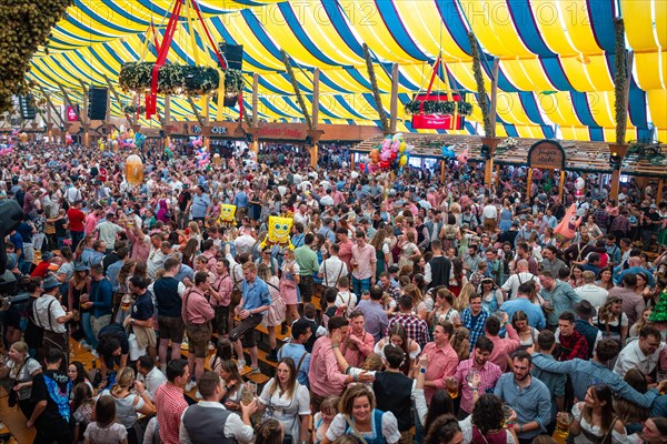 Beer tent full of drunken people