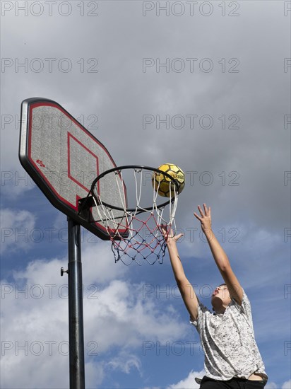 Basketball Jump with the ball to the basket and net