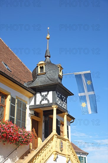 Historic town hall built 1532 with town flag