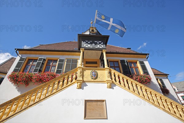 Historic town hall built 1532 with town flag