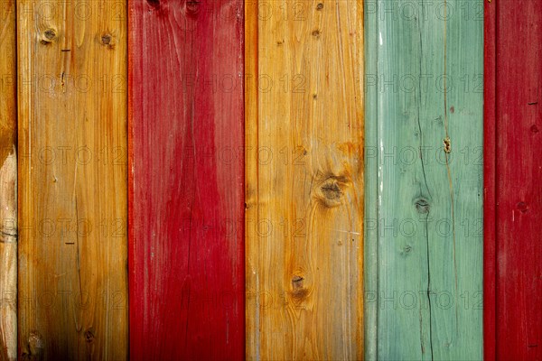 Shuttering made of coloured wooden boards as background or texture