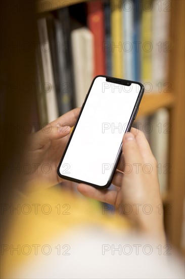 Blank screen smartphone female hands