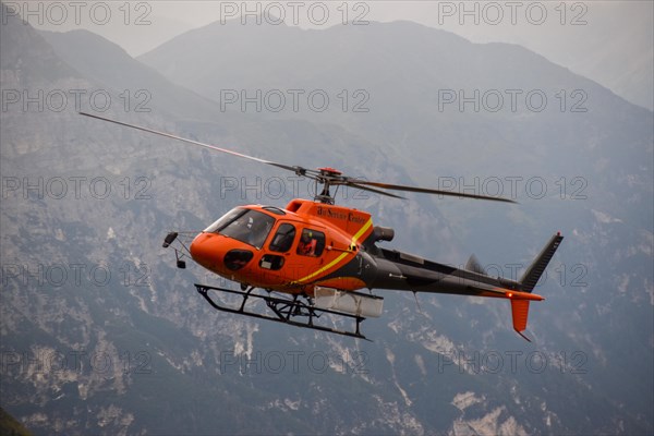 Aerospatiale 350B3 Ecureuil helicopter from the Air Service Centre on a supply flight to the Magdeburger Huette in the Stubai Alps