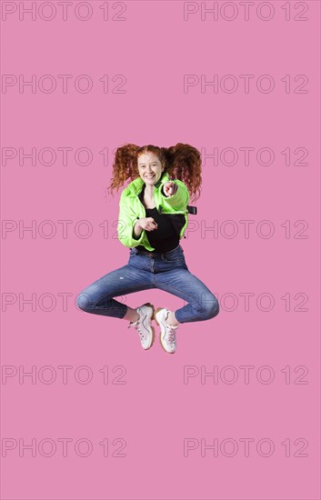 Portrait young woman jumping 5