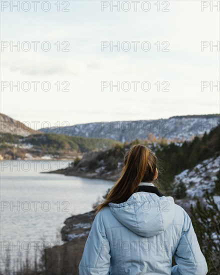 Back view young woman nature 2