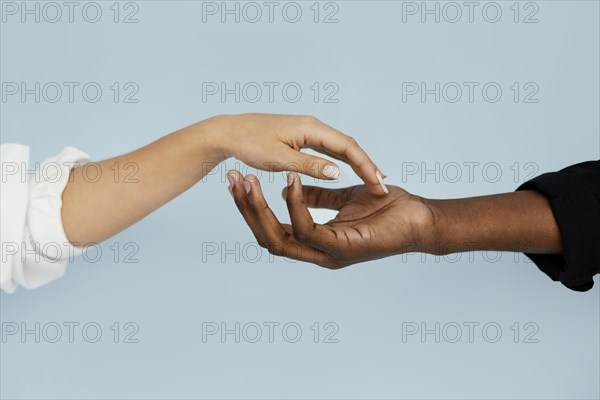 Close up white black hand