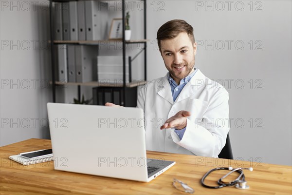Medium shot doctor working desk