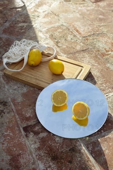 Mirror with fresh lemons