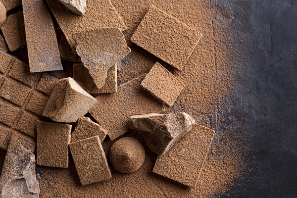 Flat lay candy with chocolate cocoa powder