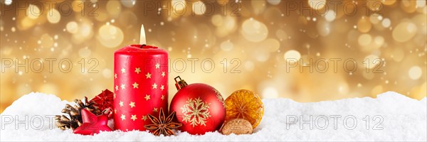 Christmas card card with candle for Christmas decoration Christmas decoration Advent season panorama golden background with text free space Copyspace in Stuttgart