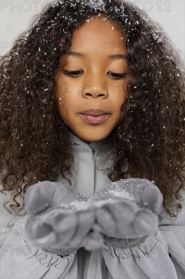 Close up girl posing with snow