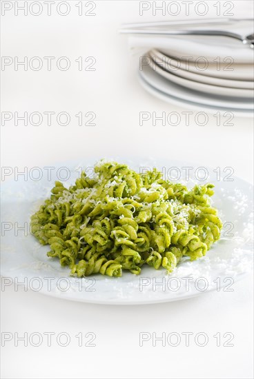 Italian fusilli pasta and fresh homemade pesto sauce