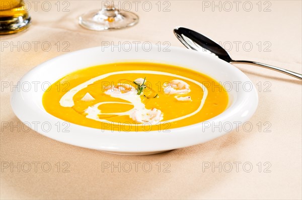 Fresh pumpkin and shrimps cream soup