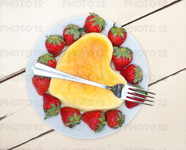 Heart shaped cheesecake with strawberryes ideal cake for valentine day