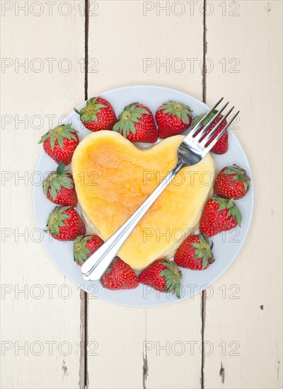 Heart shaped cheesecake with strawberryes ideal cake for valentine day