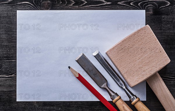 Firmer chisels wooden mallet pencil clean paper construction concept