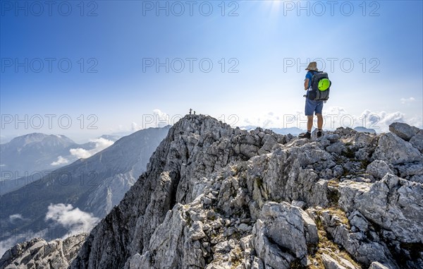 Mountaineer on rocky mountain path