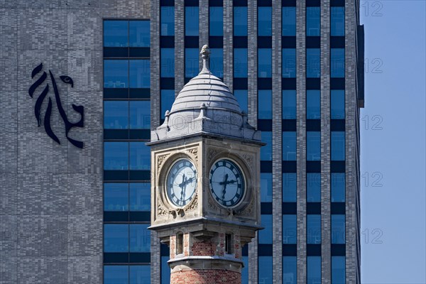 Gent-Sint-Pieters railway station clock tower and Virginie Loveling building