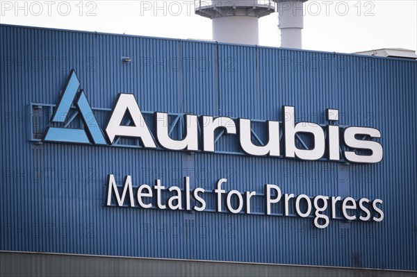 Logo and lettering Aurubis Metal for Progress on a factory building at the Aurubis AG plant