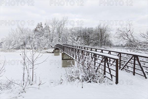 Winter, pedestrian bridge to an island, Saint Lawrence River, Province of Quebec, Canada, North America