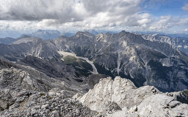 View of Wimbachgries valley and mountain panorama with rocky mountain peak of the Hochkalter, at the summit of the Watzmann Mittelspitze, Berchtesgaden National Park, Berchtesgaden Alps, Bavaria, Germany, Europe