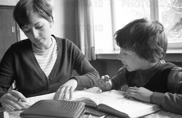 DEU, Germany, Dortmund: Personalities from politics, business and culture from the years 1965-71. Students giving private tuition ca. 1965-6, Europe