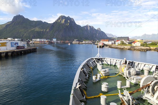 Hurtigruten ferry ship arriving at harbour at Svolvaer, Lofoten Islands, Nordland, Norway, Europe