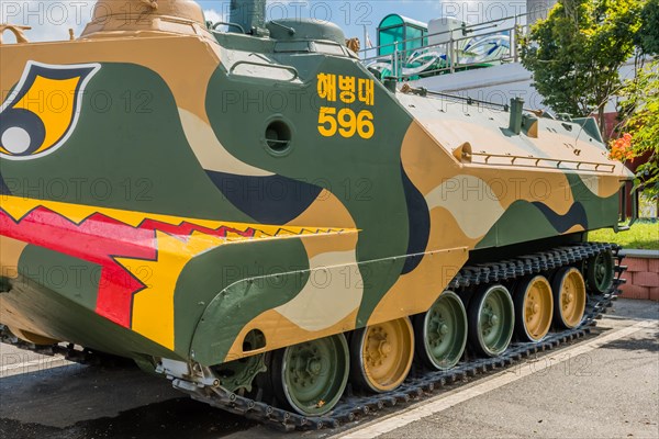 Side view of LVTP-7 amphibious assault vehicle on display at seaside park in Seosan, South Korea, Asia