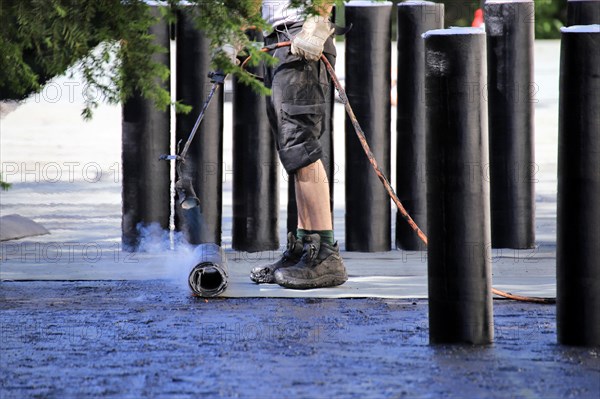 Professional flat roof waterproofing with bitumen welding membranes