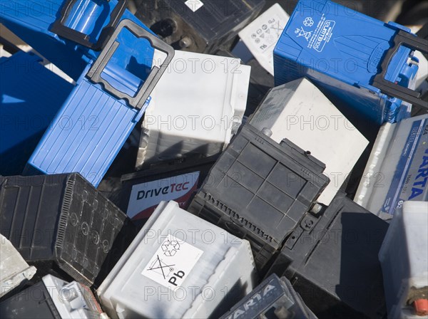 Car batteries in skip for recycling