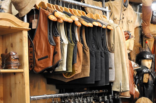 RETRO CLASSICS 2010, Stuttgart Messe, Stuttgart, Baden-Wuerttemberg, Germany, Europe, Interior view of a clothing shop with various jackets and trousers, Europe