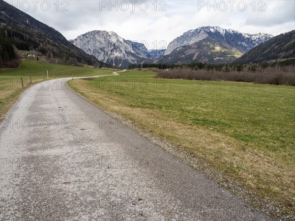 Country road in front of mountain panorama, mountain Pribitz, mountain Messnerin, Oberort, municipality Tragoess-St. Katharein, Styria, Austria, Europe