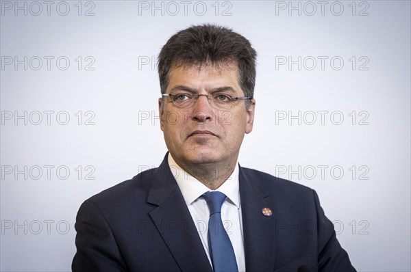 Janez Lenarcic, EU Commissioner for Humanitarian Aid and Crisis Management, takes photos during his participation in the international humanitarian conference on Sudan and its neighbours