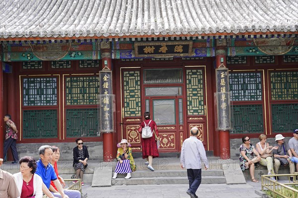 New Summer Palace, Beijing, China, Asia, People in front of a richly decorated traditional temple, Beijing, Asia
