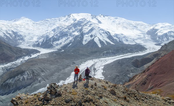 Aerial view, panorama, high mountain landscape with glacier moraines and glacier tongues, glaciated and snow-covered mountain peaks, Lenin Peak and Peak of the XIX Party Congress of the CPSU, Traveller's Pass, Trans Alay Mountains, Pamir Mountains, Osher Province, Kyrgyzstan, Asia