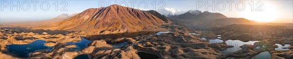 Aerial view, high mountain landscape with glacial moraines and mountain lakes, behind Pik Lenin, Trans Alay Mountains, Pamir Mountains, Osher Province, Kyrgyzstan, Asia