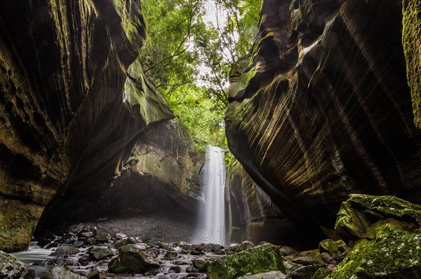 Beautiful waterfall in long exposure photography, known as the waterfall of the swallows, located in Rolante in Brazil. Location for trekking and camping