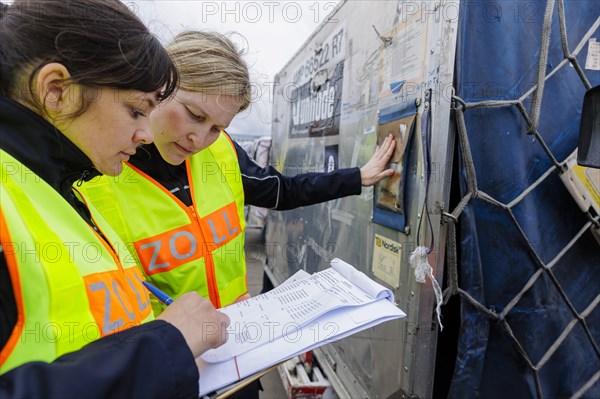 Customs officers check a load of an aircraft that has landed in the cargo area at the airport, Frankfurt am Main, 03.05.2024