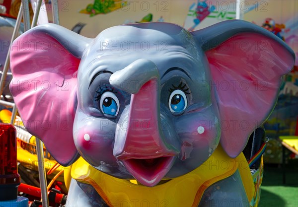 Elephant Dumbo in a children's carousel, Spring Festival Deggendorf, Lower Bavaria, Bavaria, Germany, Europe