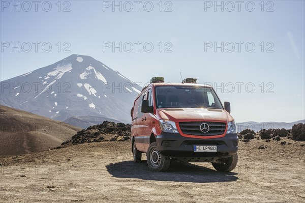 Campervan in front of the Lonquimay volcano, Lonquimay volcano, Malalcahuello National Reserve, Curacautin, Araucania, Chile, South America