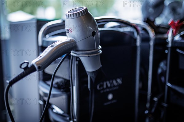 The hairdryer of a hairdresser, taken in the hairdressing salon Coiffeur Sivan in Berlin, 22/04/2024