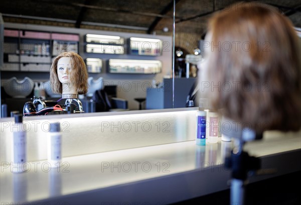 A training head for hairdressers, taken in the hairdressing salon Coiffeur Sivan in Berlin, 22/04/2024